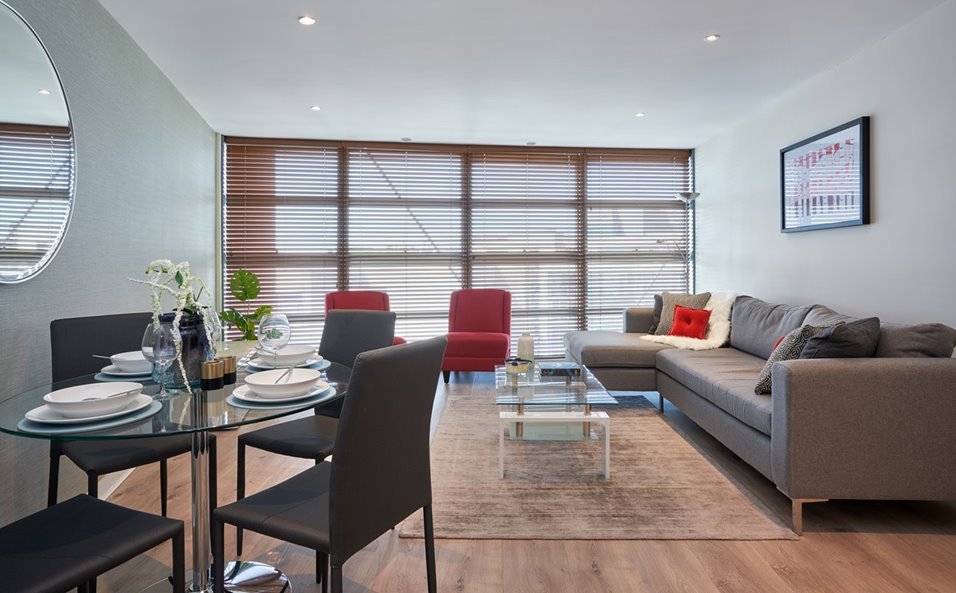 A living room colouring grey and red