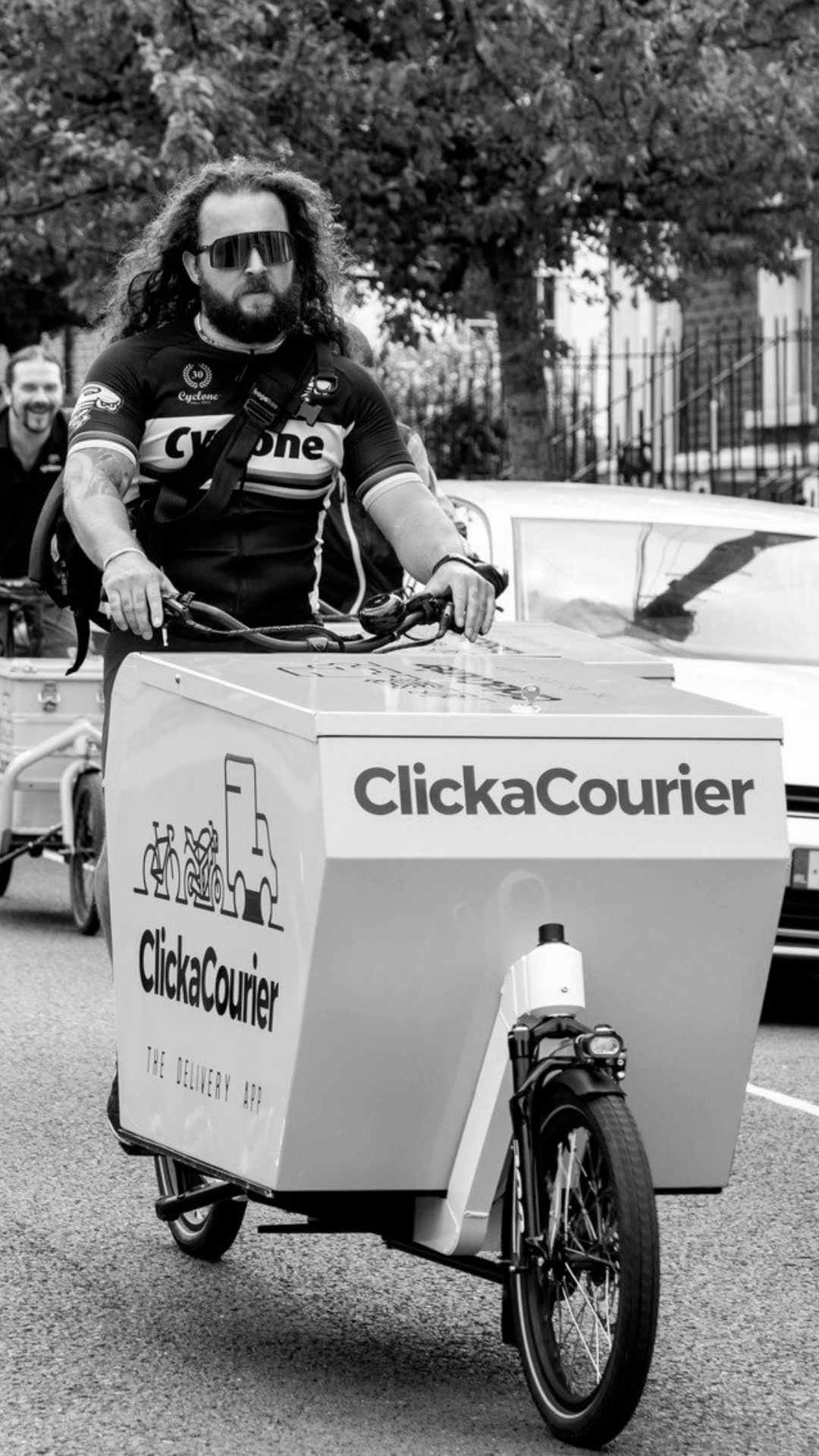 Man riding cargo bike for delivery