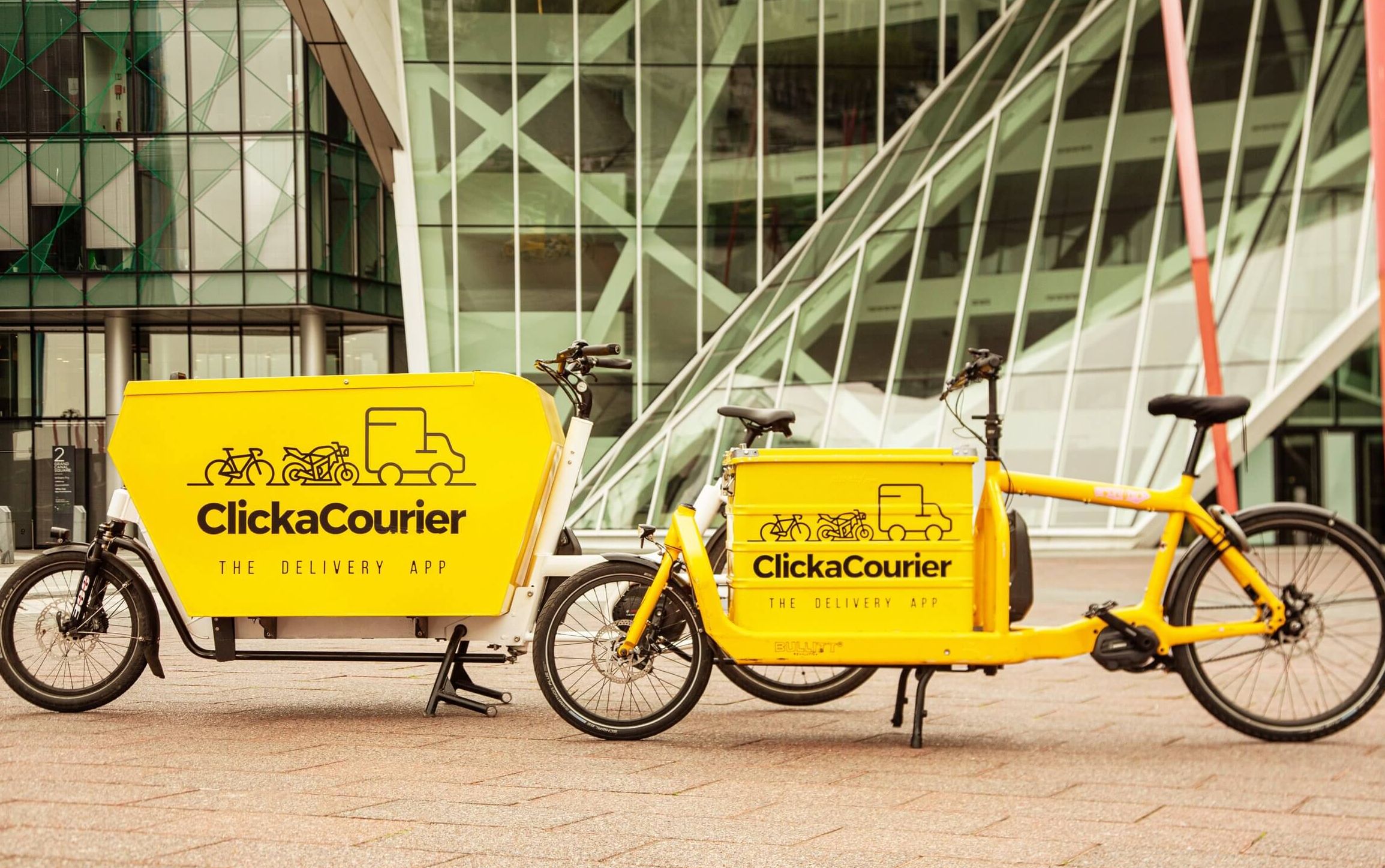 Yellow delivery bikes with branding